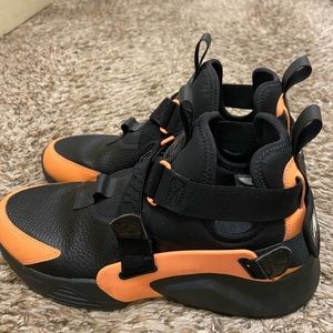 Womens black and orange  huarache  size 10